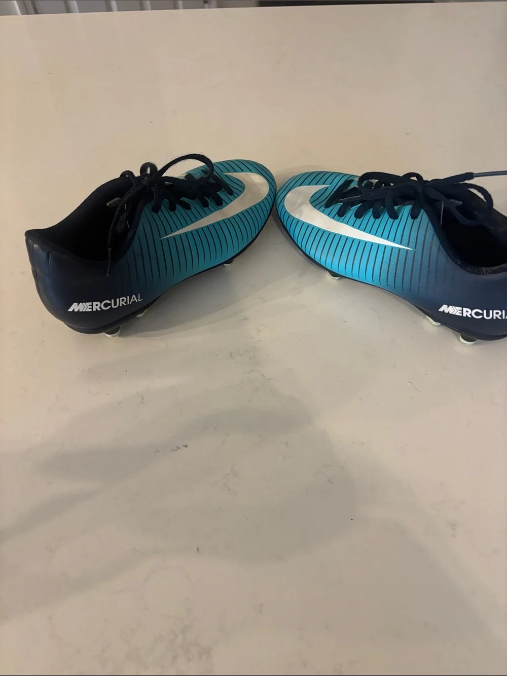 Nike Kids Teal and Navy Striped Soccer Shoes